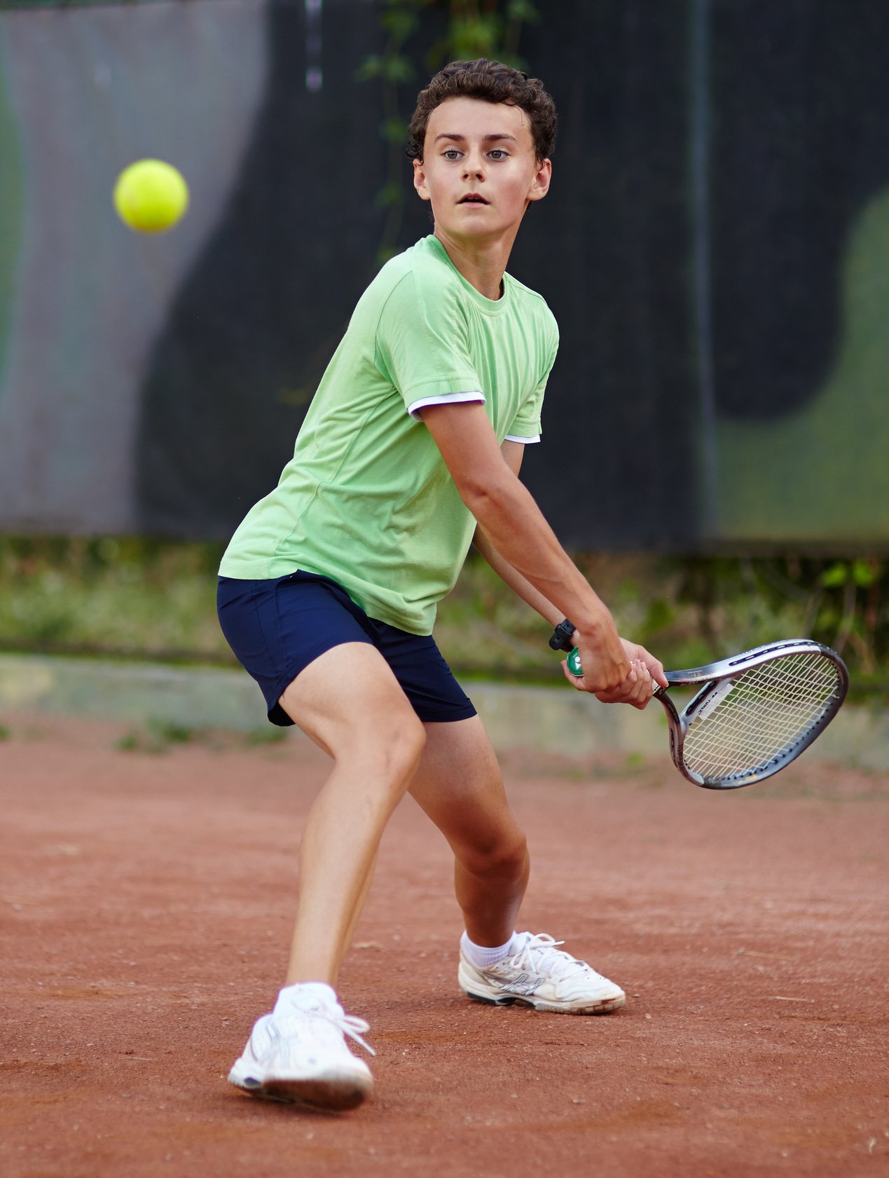 Child Playing Tennis